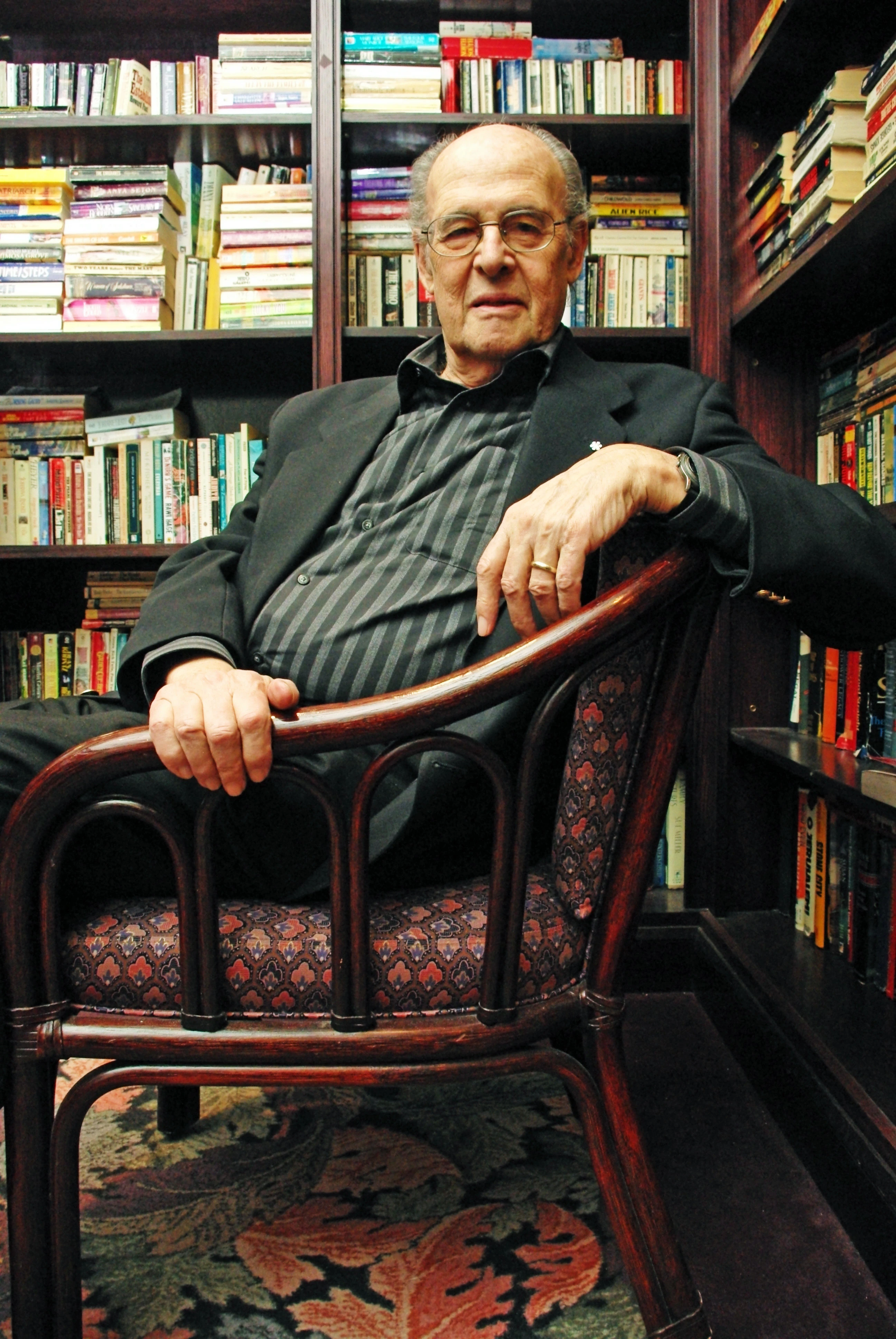 Ronald Melzak  seated in library